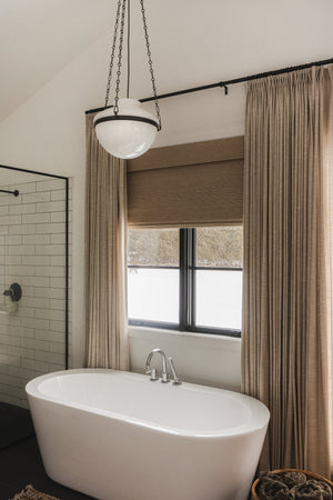 Paradigm Pendant 19" styled in a welcoming entryway for warm, layered light at Laurie Yapp Home.