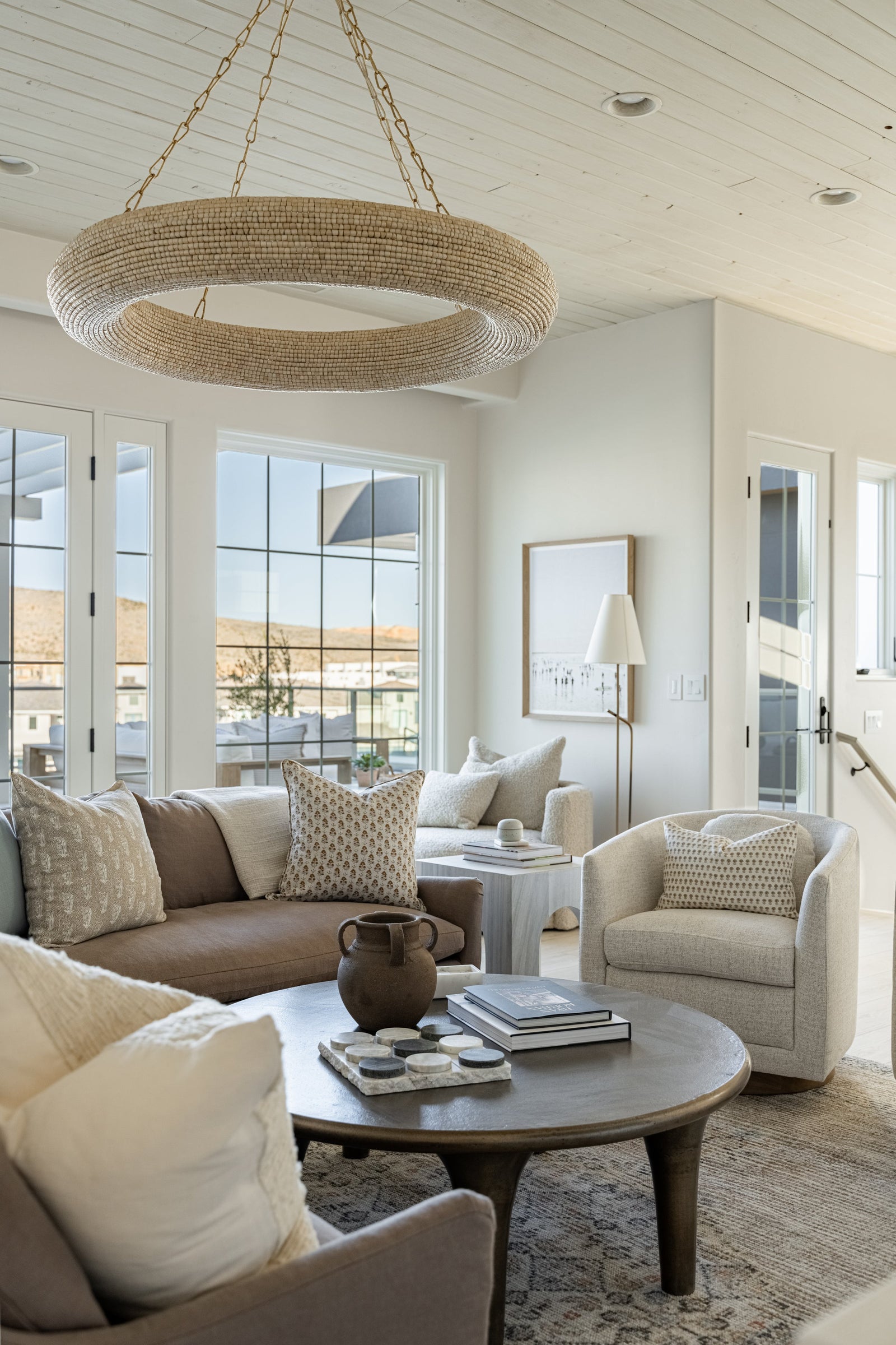 Lure Chandelier 50" — a Corbett chandelier for dining rooms, entries, and living rooms at Laurie Yapp Home.