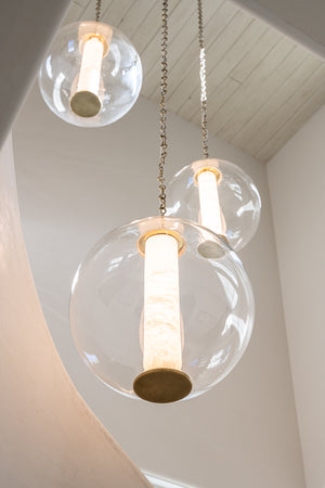 Pietra Pendant 16" styled in a bright kitchen for warm, layered light at Laurie Yapp Home.