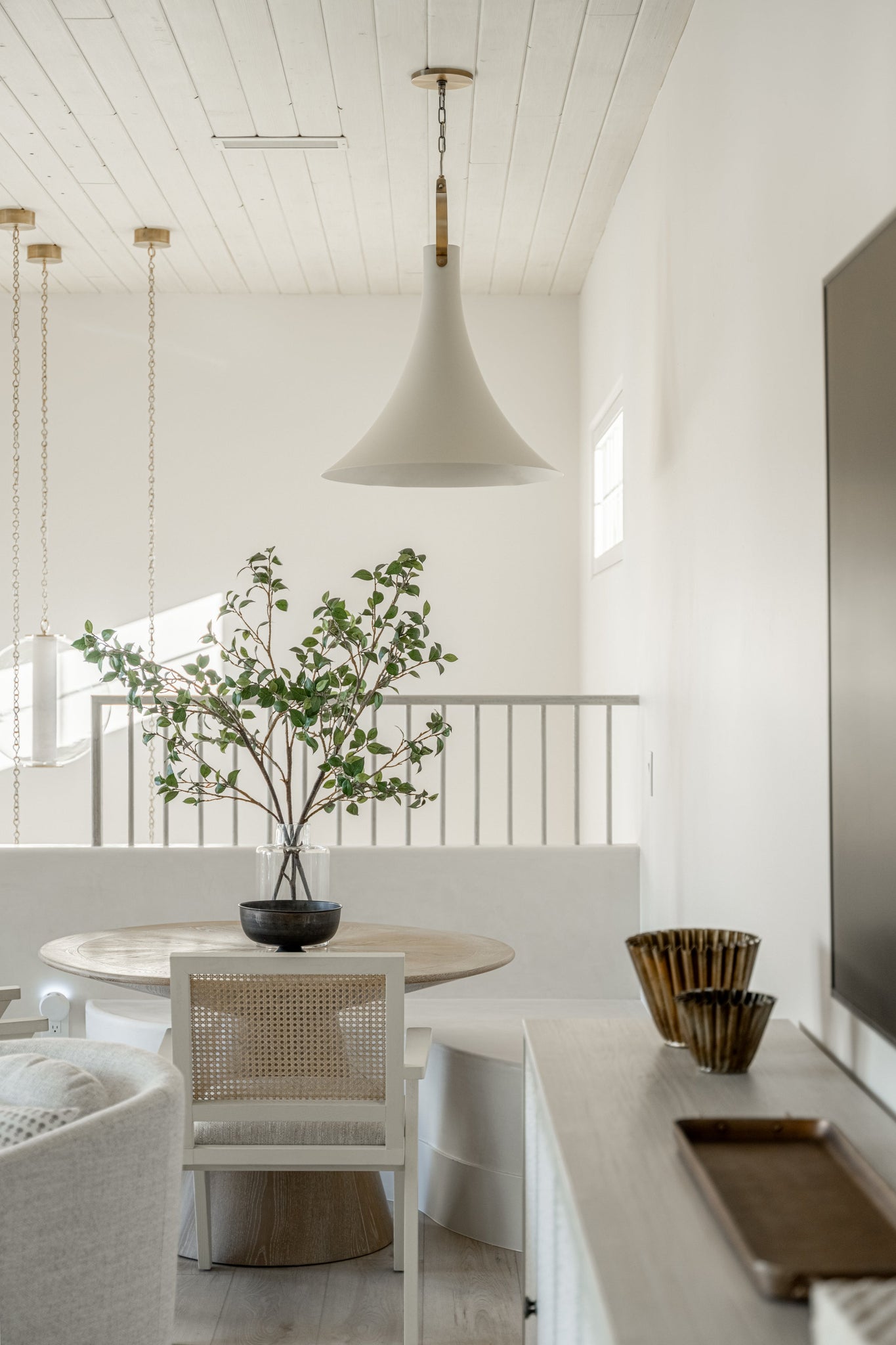 Pietra Pendant 20" styled in a welcoming entryway for warm, layered light at Laurie Yapp Home.