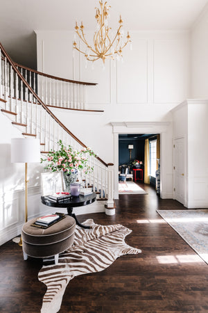 Prosecco Chandelier 46.25" styled in an elegant dining room for warm, layered light at Laurie Yapp Home.