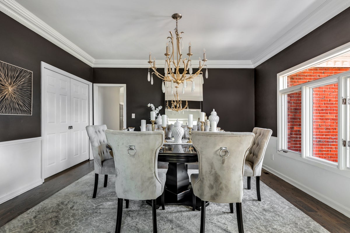 Prosecco Chandelier 34.75" styled in a formal living room for warm, layered light at Laurie Yapp Home.