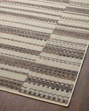 Rainier Ivory / Taupe shown from a different angle to reveal its pattern.