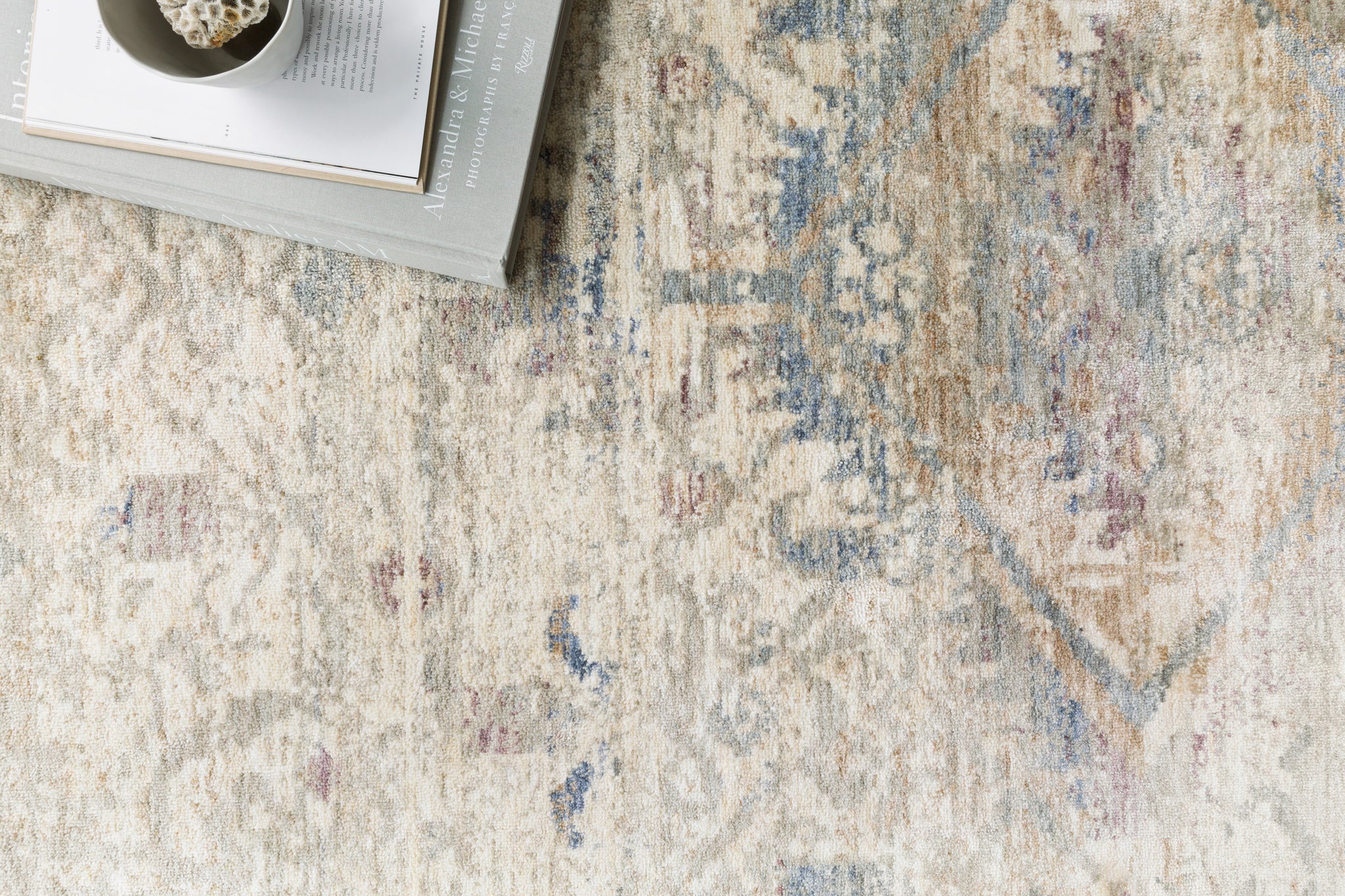 Revere Ivory / Blue shown from a different angle to reveal its pattern.
