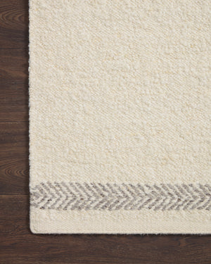 Side view of the Reyla Ivory / Silver rug.