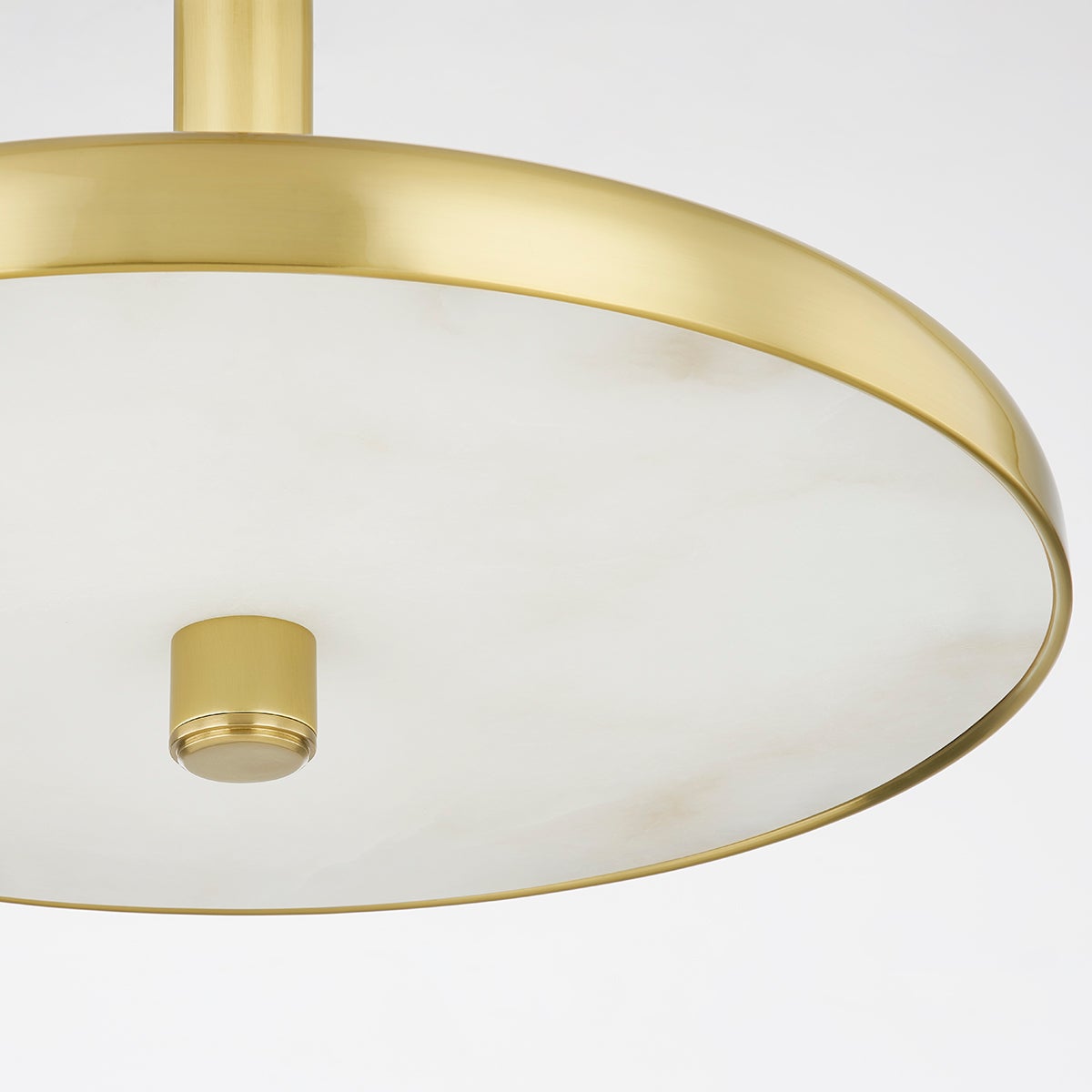 Reynolds Pendant 19.75" in aged brass shown from the front to reveal the shade shape and metal detail.