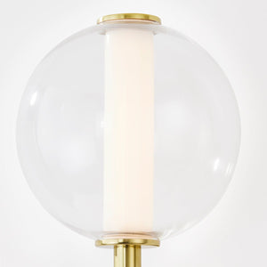 Richford Wall Sconce in aged brass shown from the front to reveal the arm curve and shade silhouette.