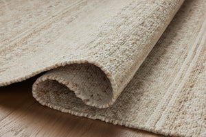 Rivers Sand / Ivory shown from a different angle to reveal its pattern.
