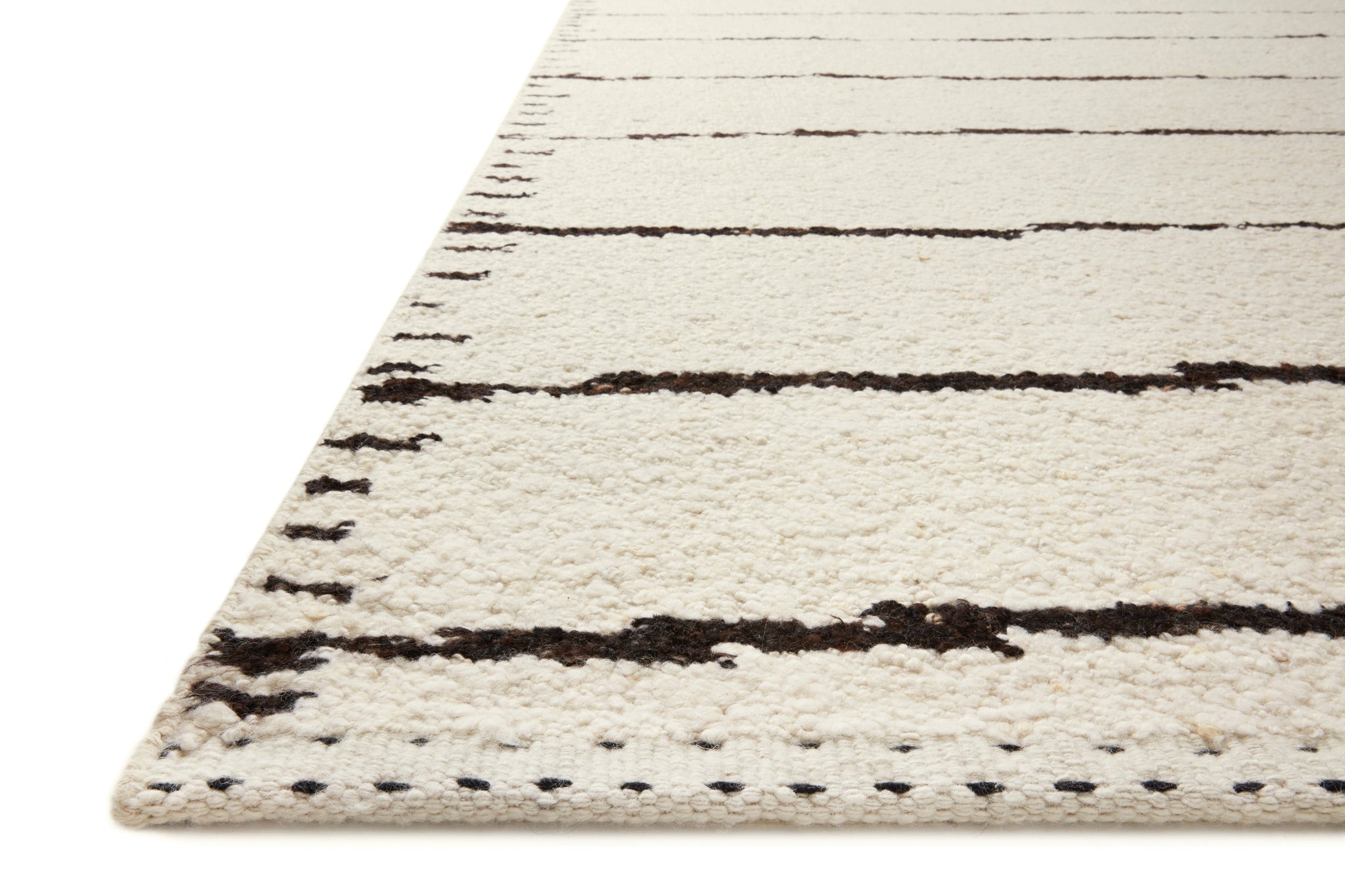 Side view of the Roman Ivory / Black rug.
