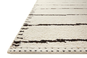 Side view of the Roman Ivory / Black rug.