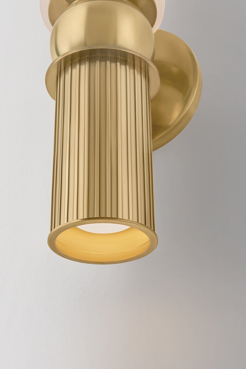 Close-up of the Ronda Wall Sconce showing the arm curve and shade silhouette.