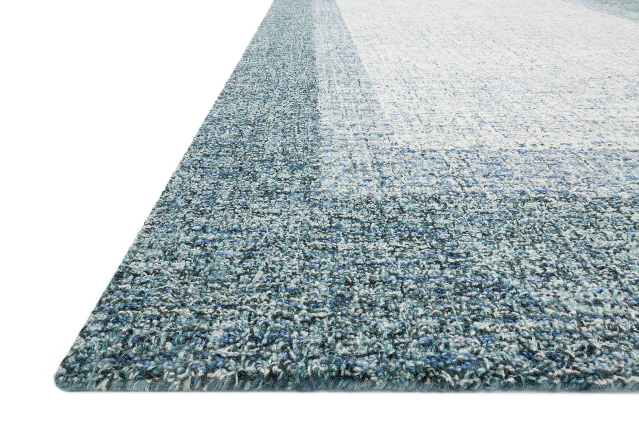 Rosina Aqua styled in a living room at Laurie Yapp Home.
