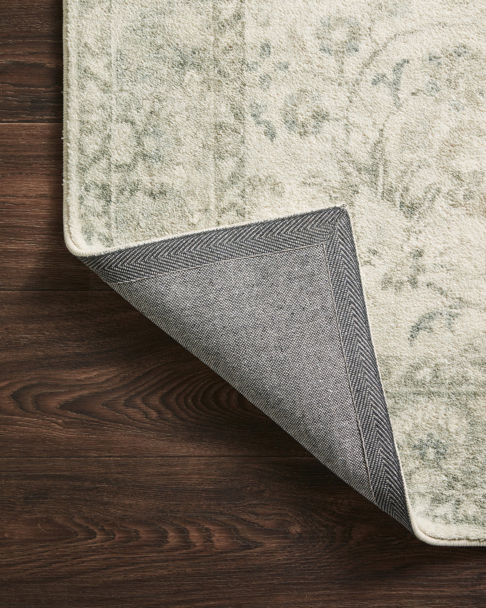 Rosette Ivory / Silver shown from a different angle to reveal its pattern.