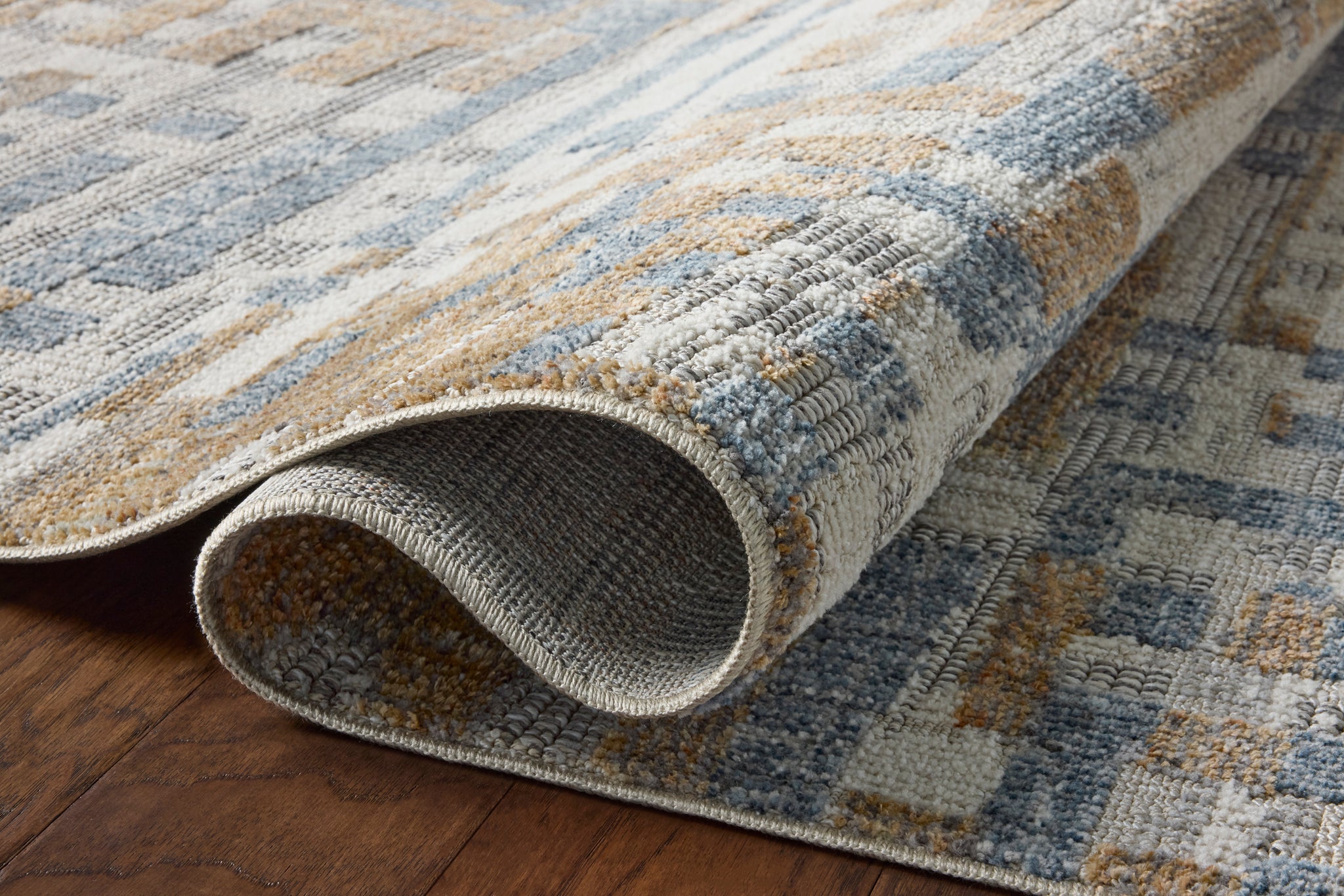 Roxie Ivory / Denim shown from a different angle to reveal its pattern.
