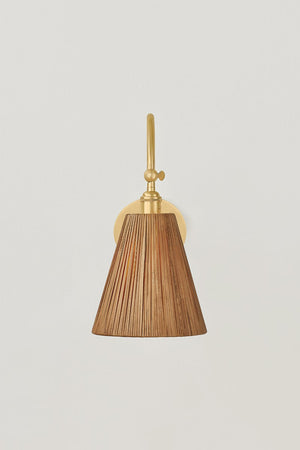 Ruthin Wall Sconce in aged brass shown from a second angle to highlight the arm curve and shade silhouette.
