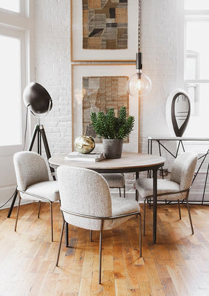 Raleigh Pendant 13" in bronze styled in a welcoming entryway for warm, layered light at Laurie Yapp Home.