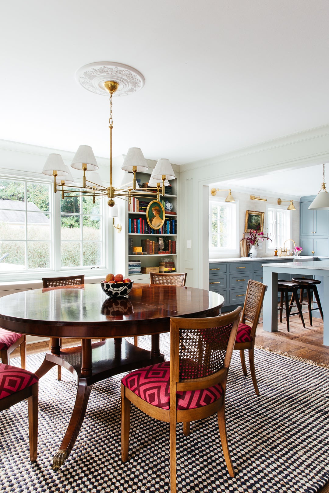 Classic No.1 Chandelier in aged brass styled in an elegant dining room for warm, layered light at Laurie Yapp Home.