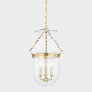 Rousham Lantern 12.75" in aged brass shown from a second angle to highlight the frame and glass panel detail.
