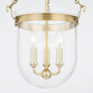 Rousham Lantern 12.75" in aged brass shown from the front to reveal the frame and glass panel detail.
