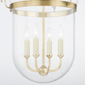 Rousham Lantern 15.75" in aged brass shown from the front to reveal the frame and glass panel detail.