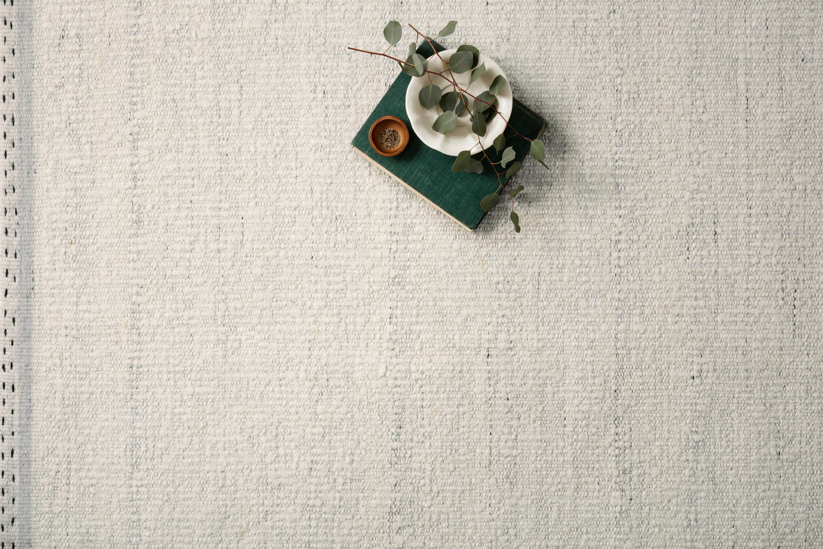 Side view of the Sloane Smoke rug.