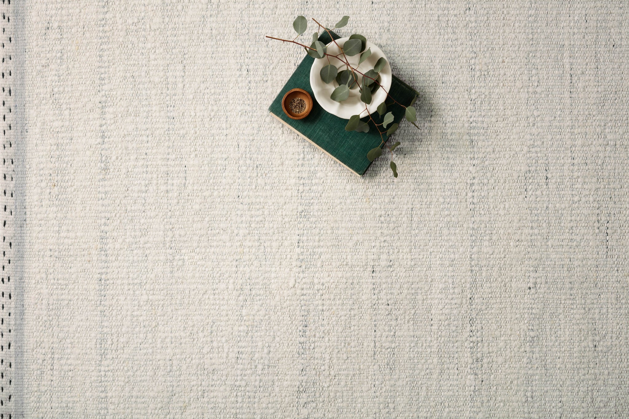 Side view of the Sloane Smoke rug.