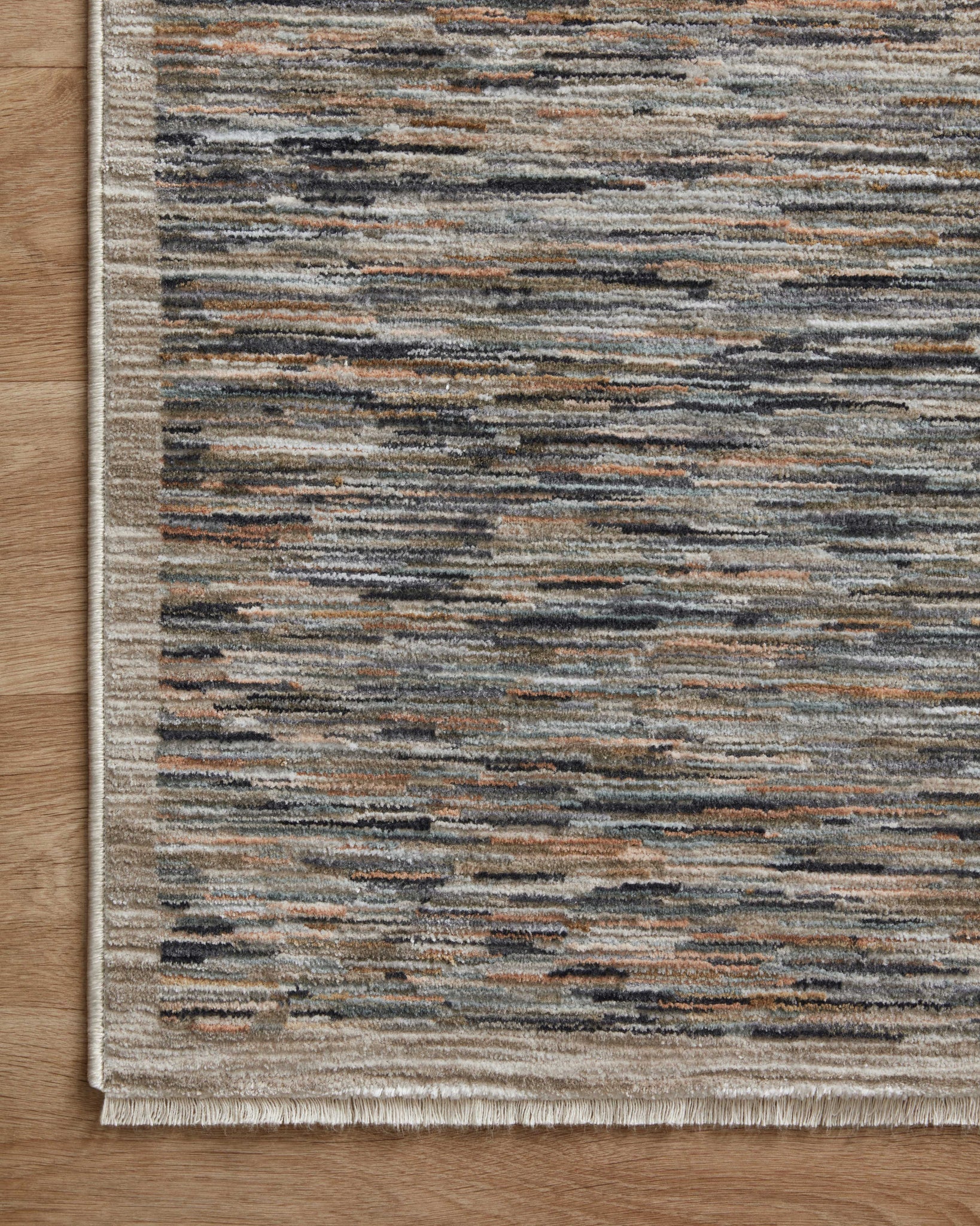 Soho Multi / Sand styled in a living room at Laurie Yapp Home.