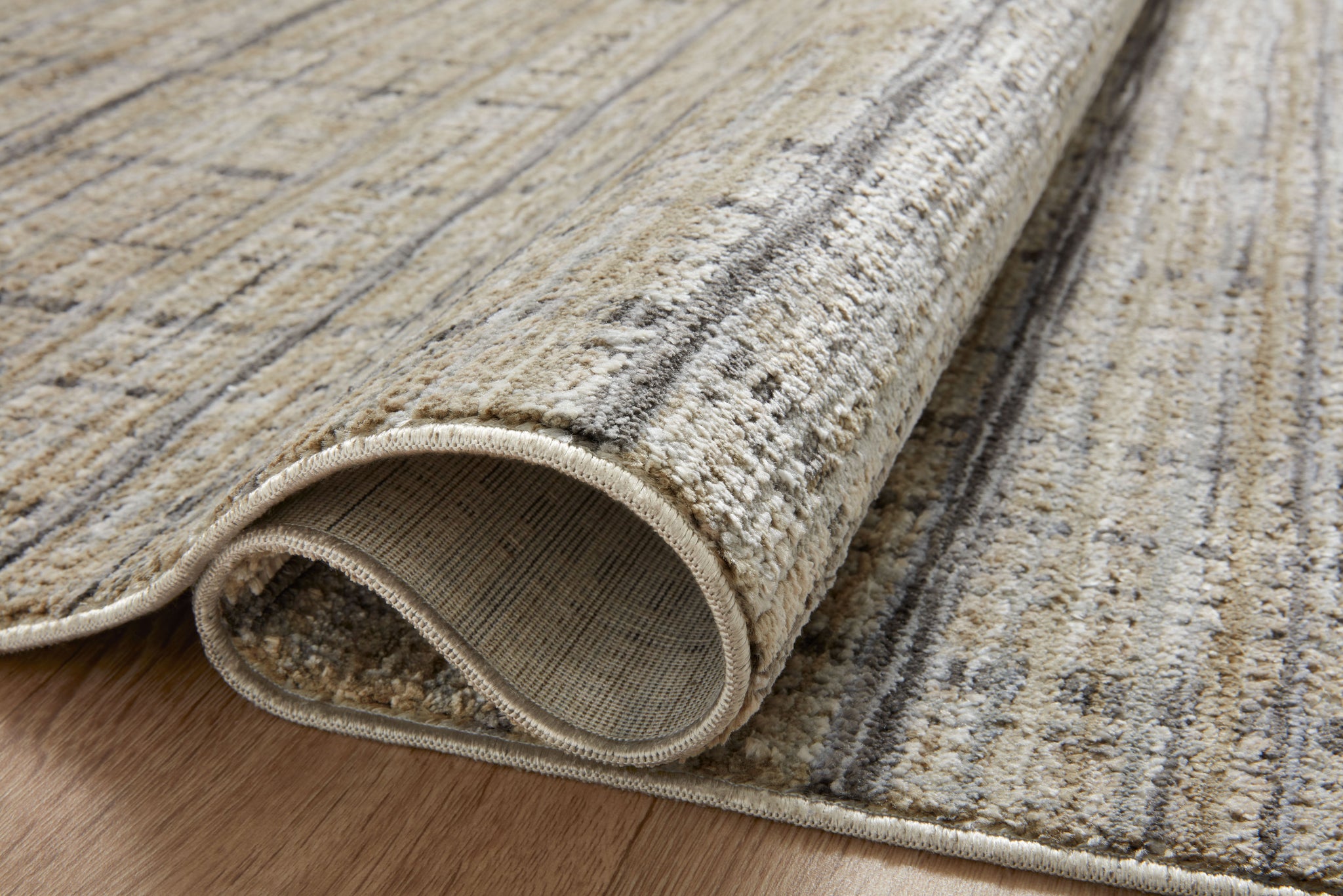 Close-up detail of the Soho Pebble / Charcoal showing its pile and weave.