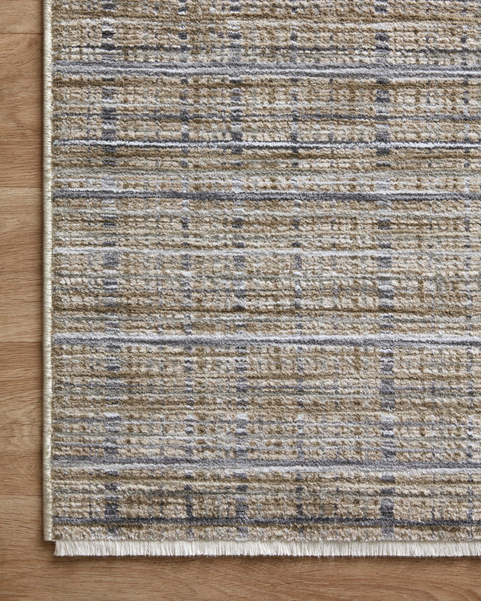 Soho Pebble / Charcoal styled in a living room at Laurie Yapp Home.