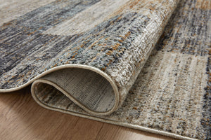 Close-up detail of the Soho Grey / Gold showing its pile and weave.