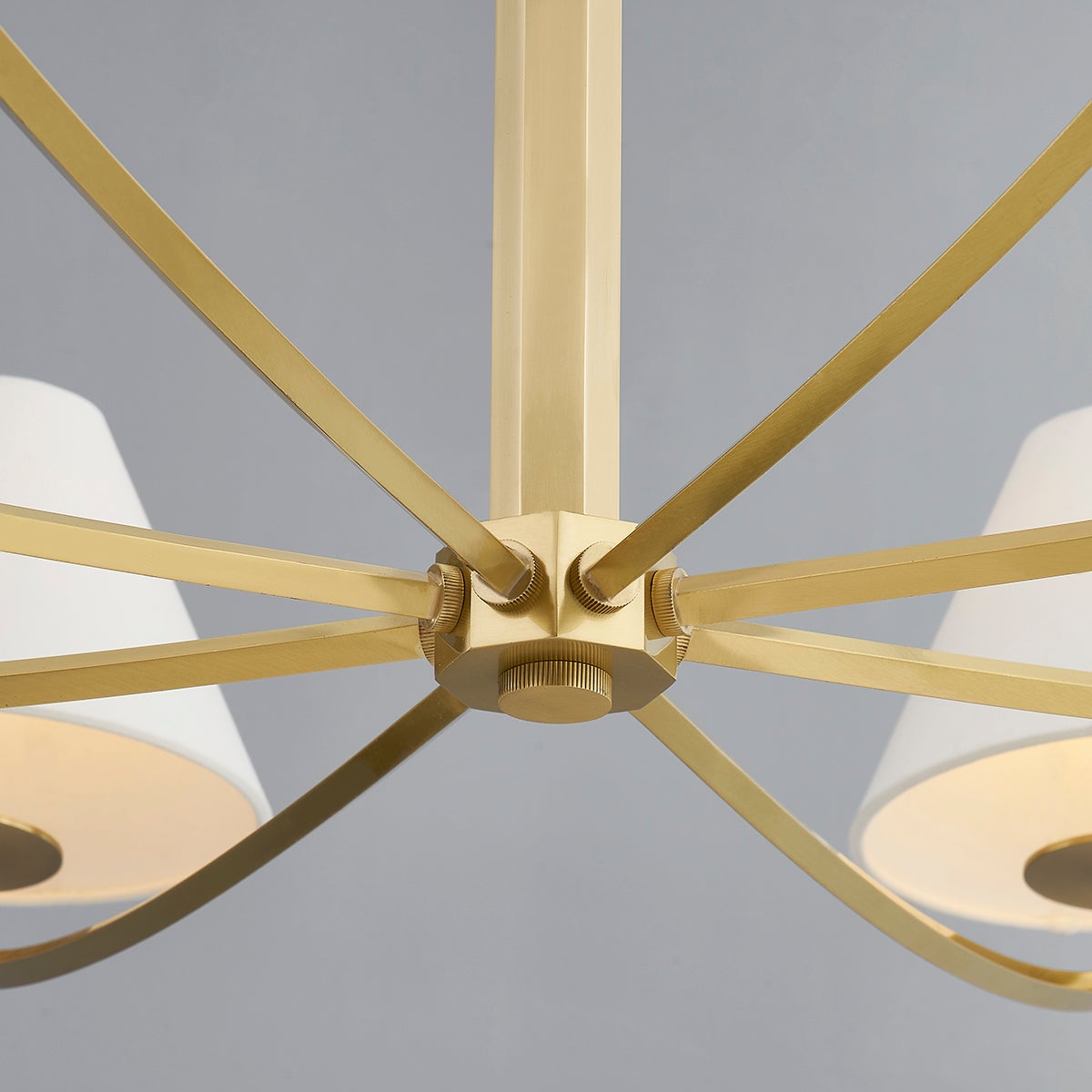 Close-up of the Stacey Chandelier 52.25" in aged brass showing the frame, arms, and shade detail.