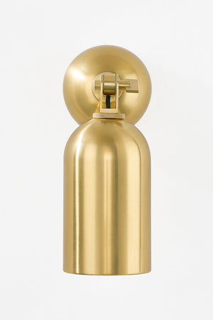 Sturbridge Wall Sconce in aged brass shown from a second angle to highlight the arm curve and shade silhouette.