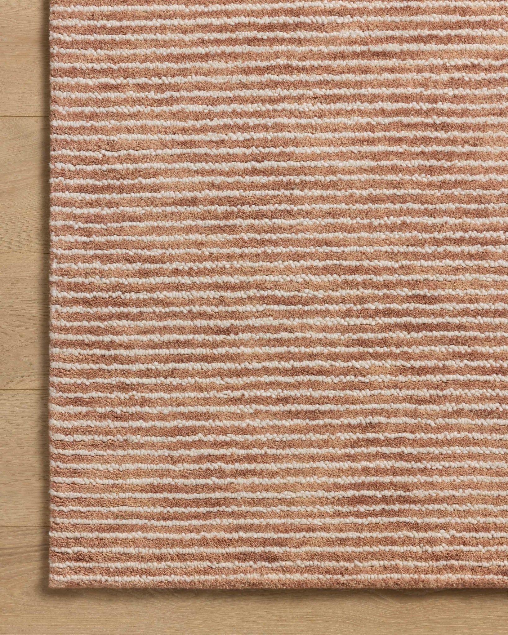 Sunday Terracotta / Ivory shown from a different angle to reveal its pattern.
