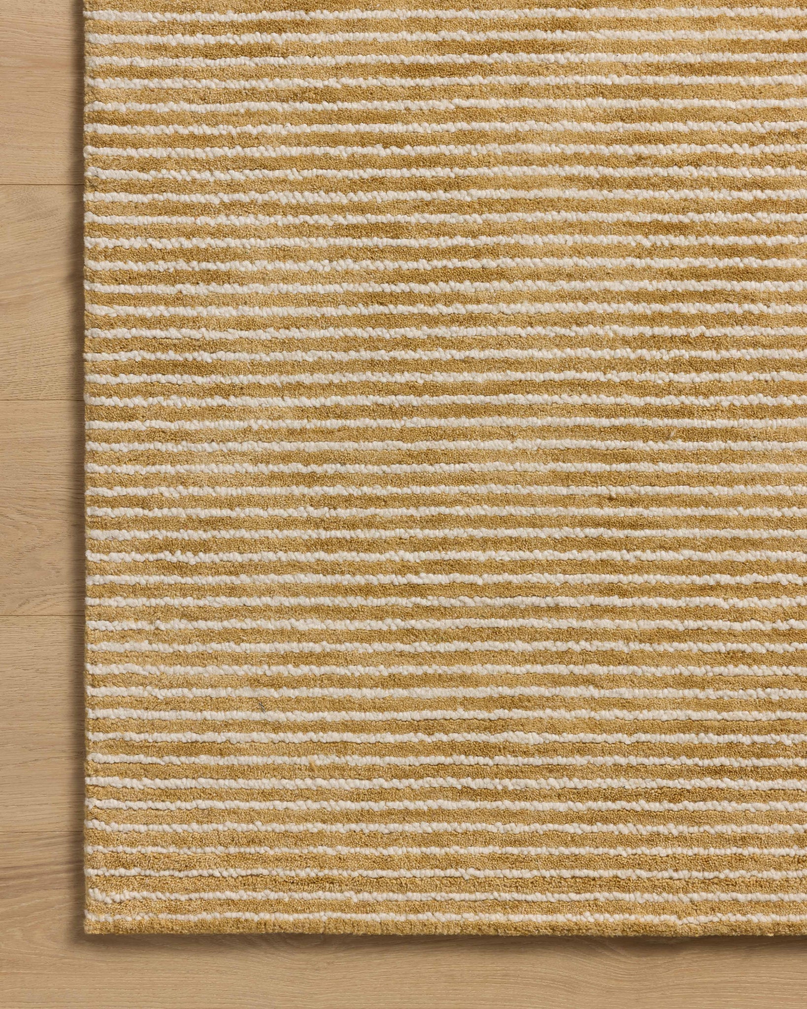 Sunday Wheat / Ivory shown from a different angle to reveal its pattern.