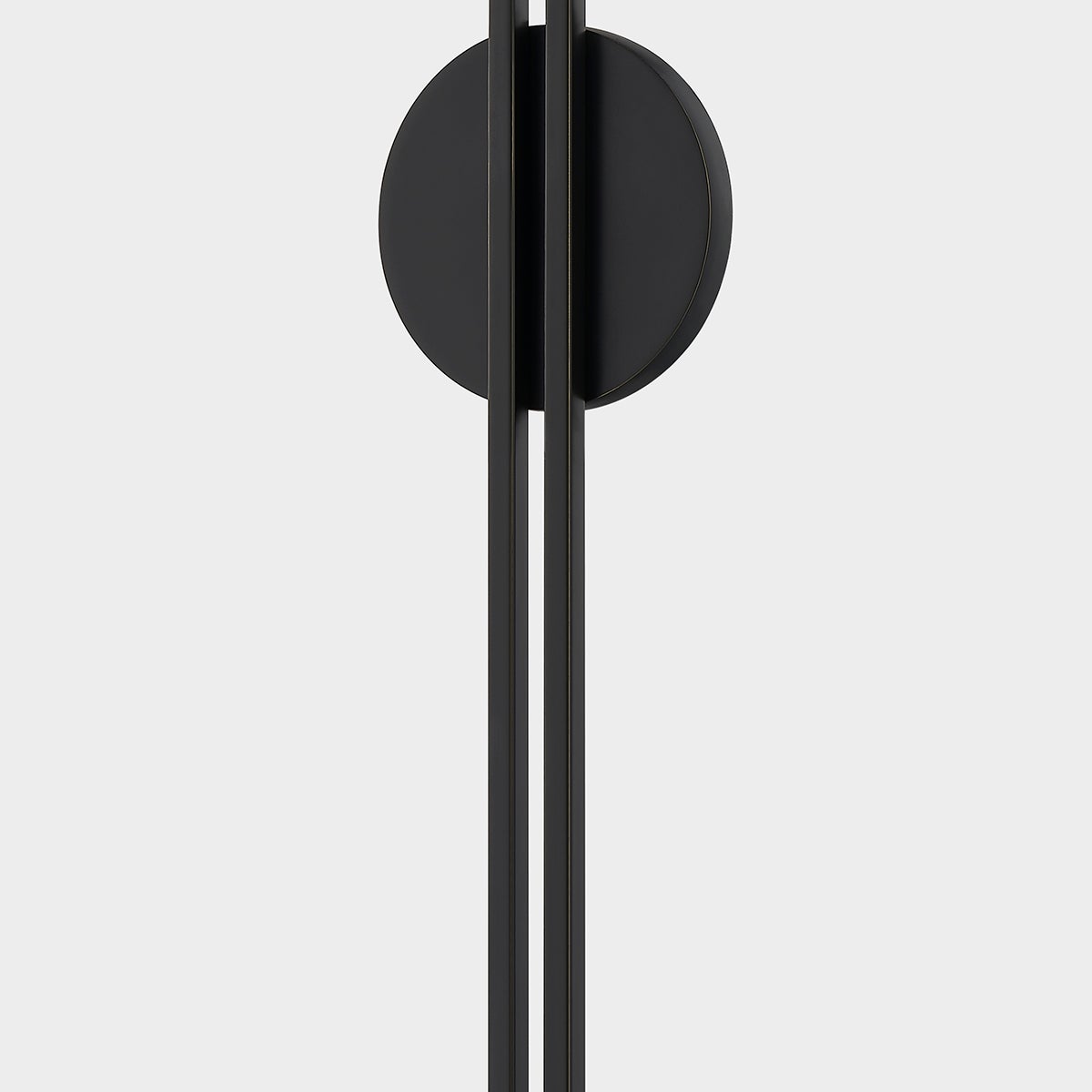 Close-up of the Shokan Wall Sconce in bronze showing the arm curve and shade silhouette.