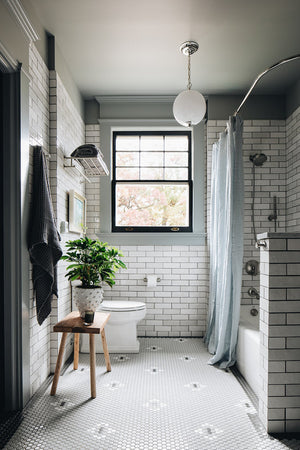 Sphere No.1 Pendant 11.25" in polished nickel styled in a bright kitchen for warm, layered light at Laurie Yapp Home.
