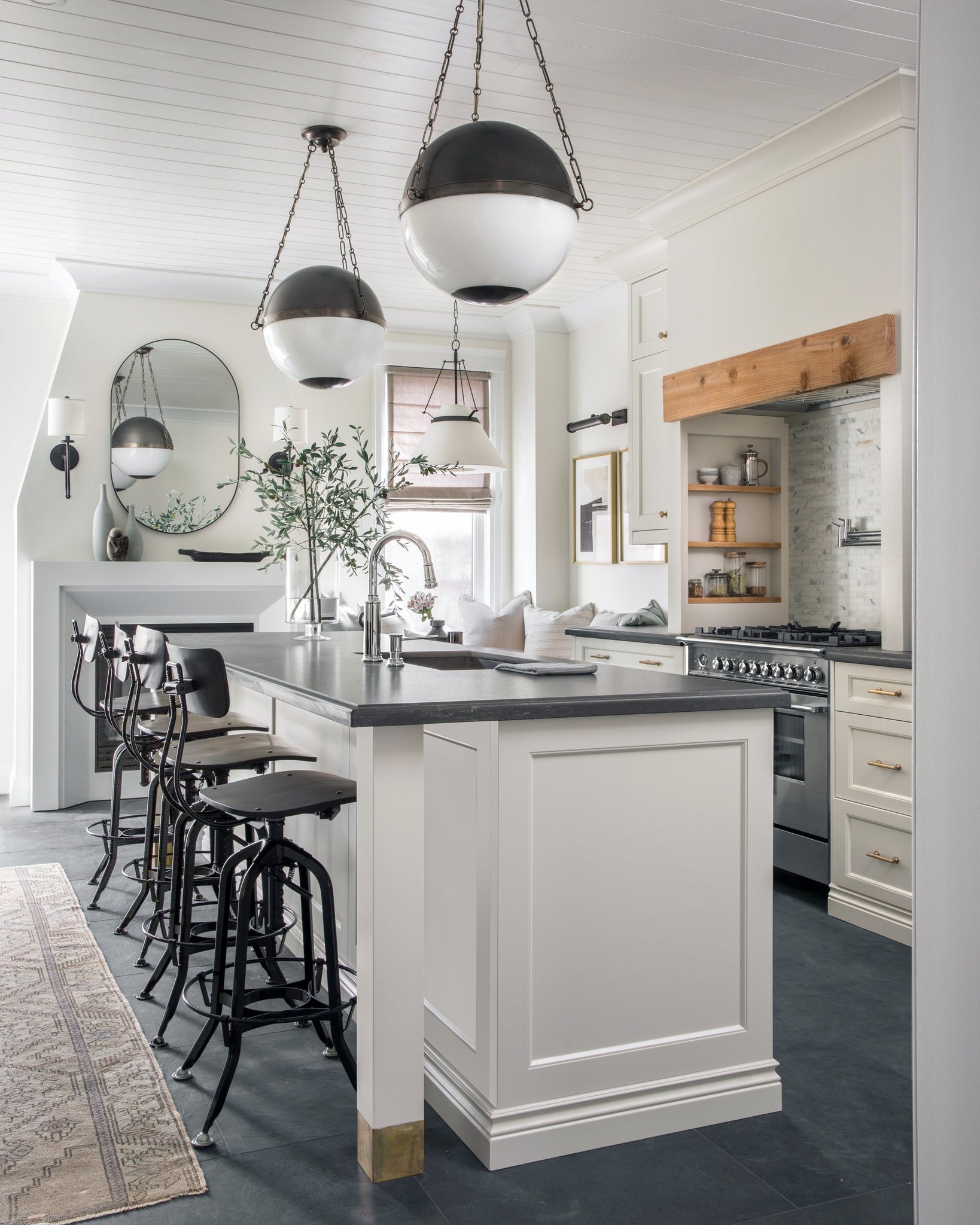 Sphere No.2 Pendant 20.5" in dark bronze styled in an elegant dining room for warm, layered light at Laurie Yapp Home.