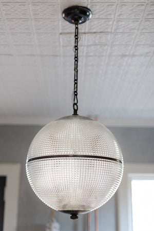 Sphere No. 3 Pendant 18.25" in dark bronze styled in a bright kitchen for warm, layered light at Laurie Yapp Home.