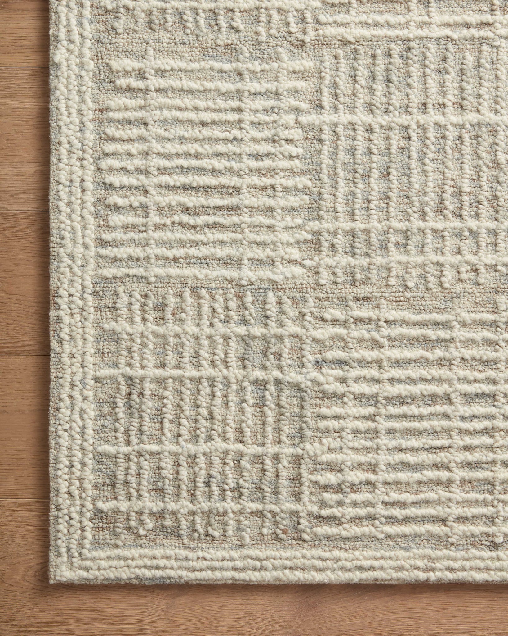 Close-up detail of the Tallulah Mist / Ivory showing its pile and weave.