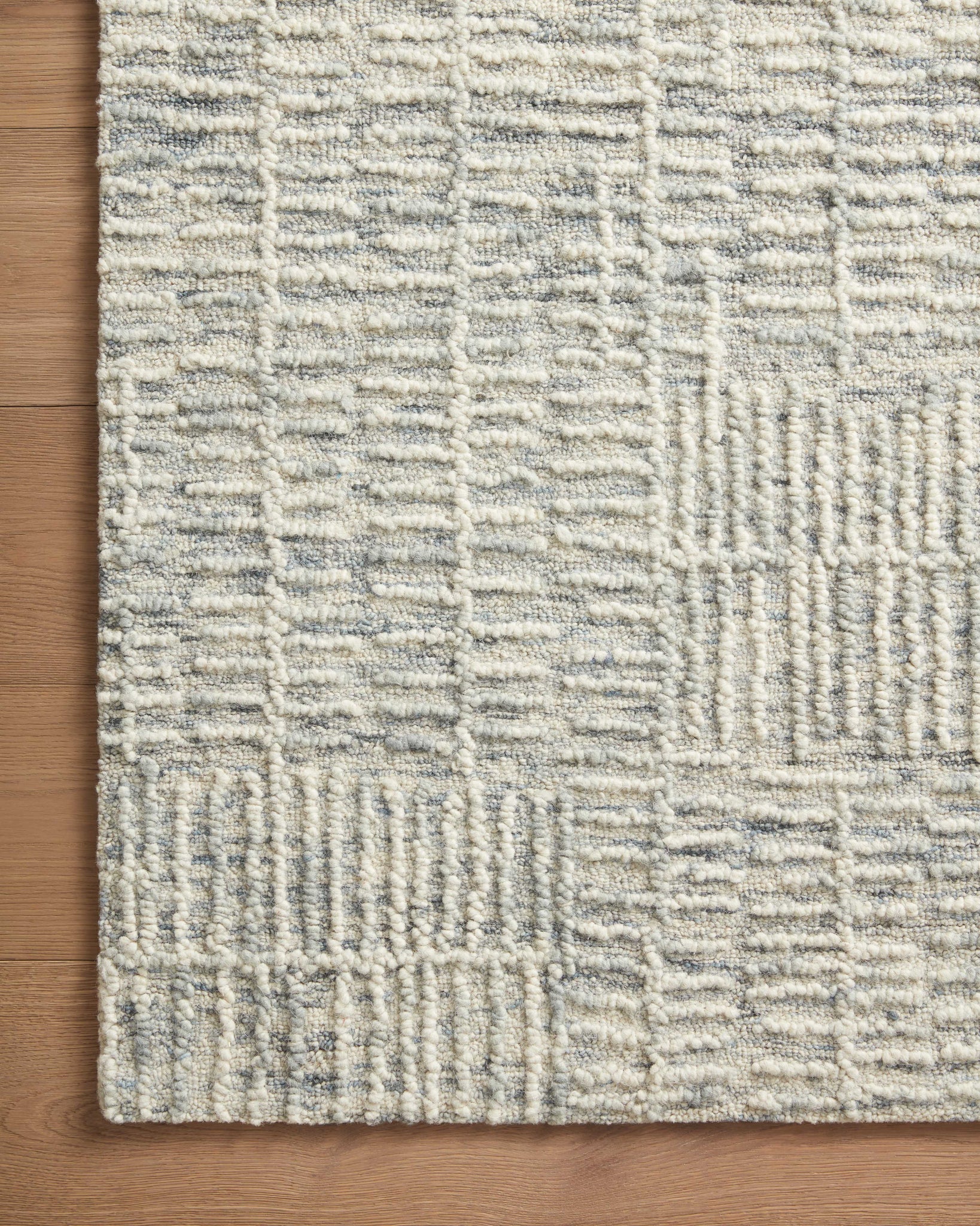 Side view of the Tallulah Sky / Ivory rug.