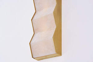 Tanzanite Wall Sconce shown from the front to reveal the arm curve and shade silhouette.