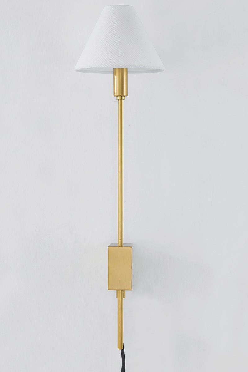 Teaneck Plug-In Sconce in aged brass — a Hudson Valley plug-in sconce for bedrooms, living rooms, and reading nooks at Laurie Yapp Home.