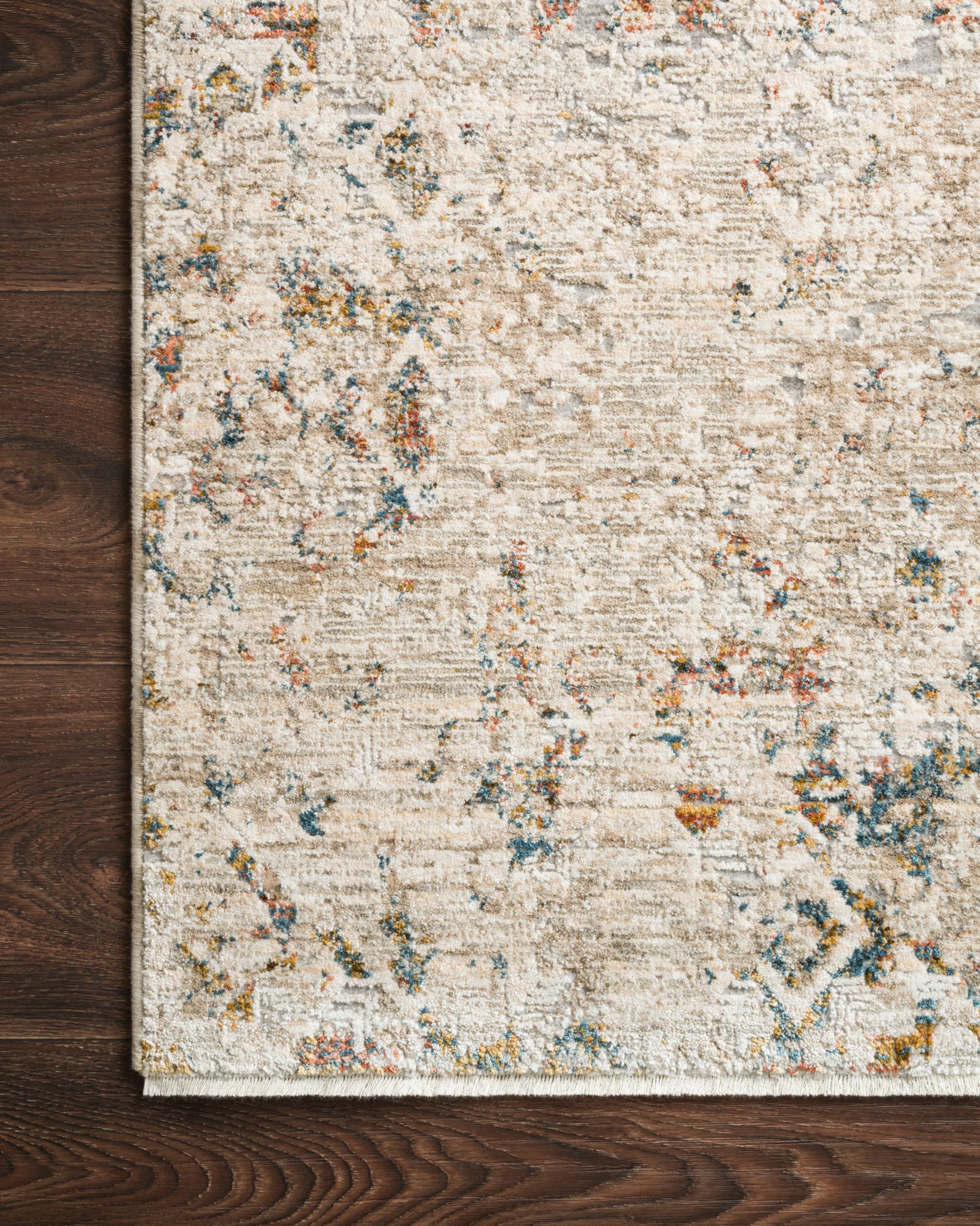 Side view of the Theia Multi / Natural rug.