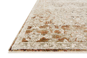 Side view of the Theia Natural / Rust rug.