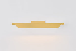 Tinwald Picture Light 27" in aged brass shown from a second angle to highlight the arm curve and shade proportion.