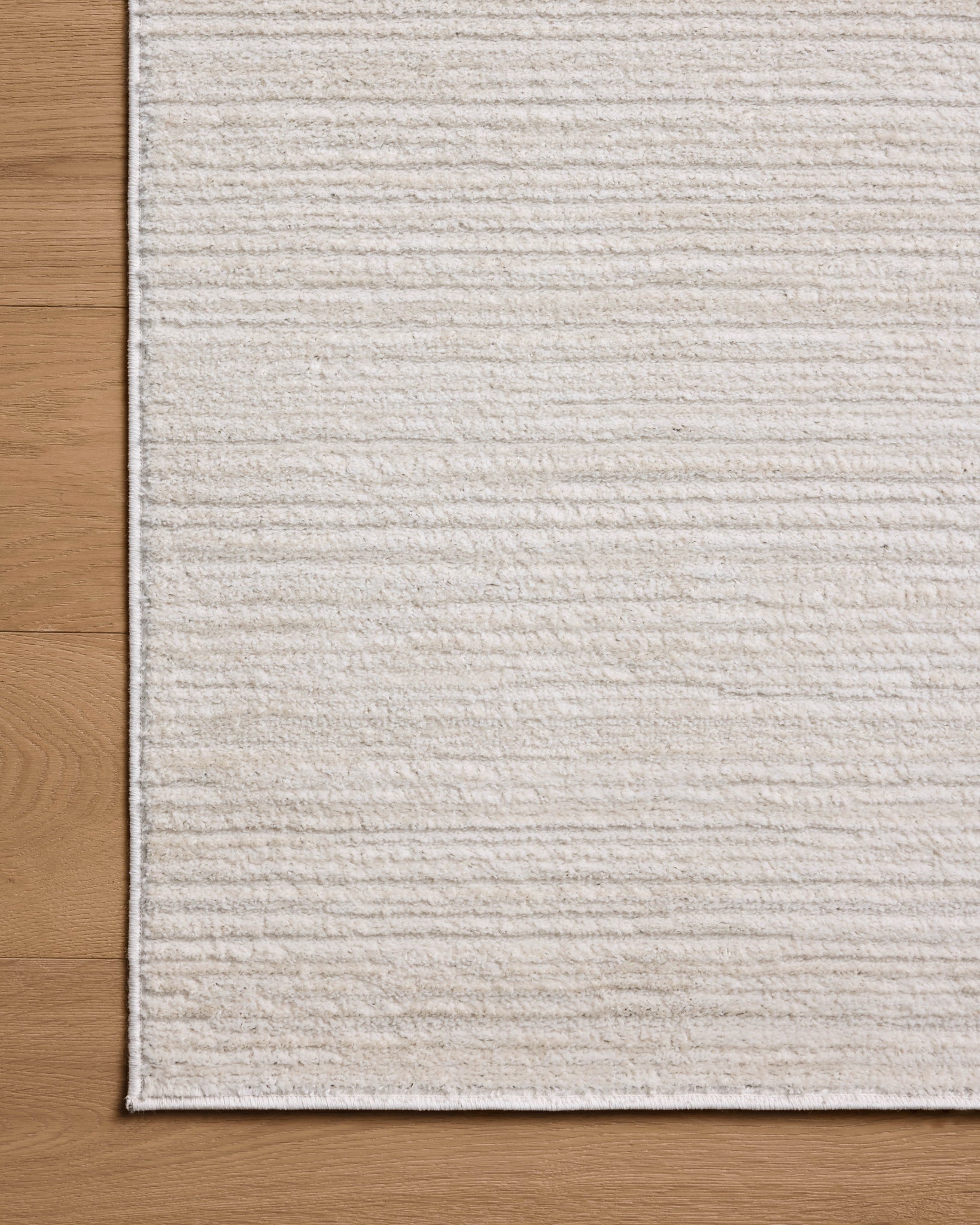 Townes Beige / Ivory shown from a different angle to reveal its pattern.