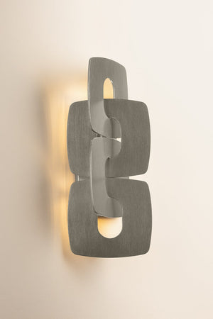 Close-up of the Trentino Wall Sconce showing the arm curve and shade silhouette.