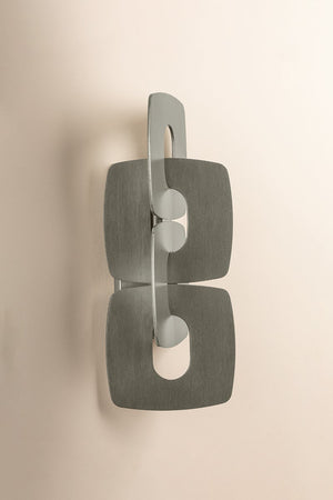 Close-up of the Trentino Wall Sconce showing the arm curve and shade silhouette.