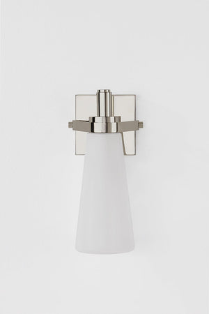 Close-up of the Trude Wall Sconce in polished nickel showing the arm curve and shade silhouette.