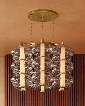 Toulouse Chandelier 42" styled in a two-story entry for warm, layered light at Laurie Yapp Home.